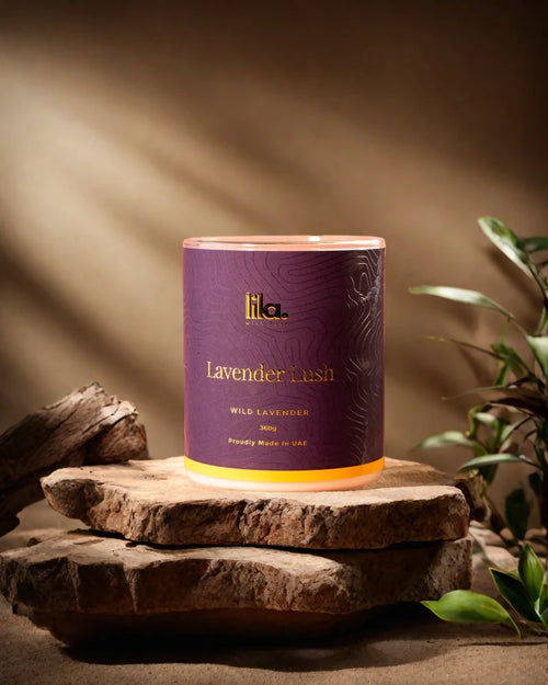 lavender lush candle from lilawith love on stone pillar in studio lighting