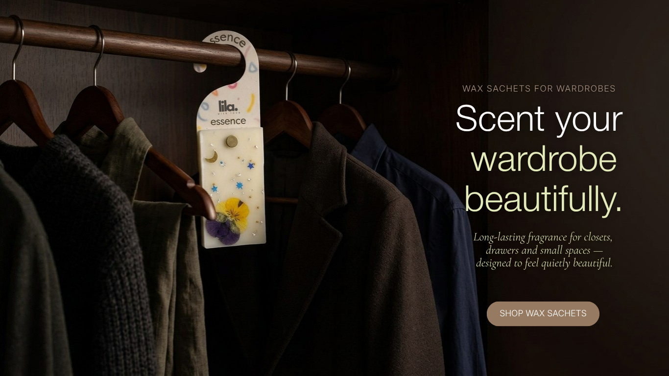 Lila.withlove wax sachet hanging on a wardrobe rail among neutral clothing, designed to scent closets and small spaces.