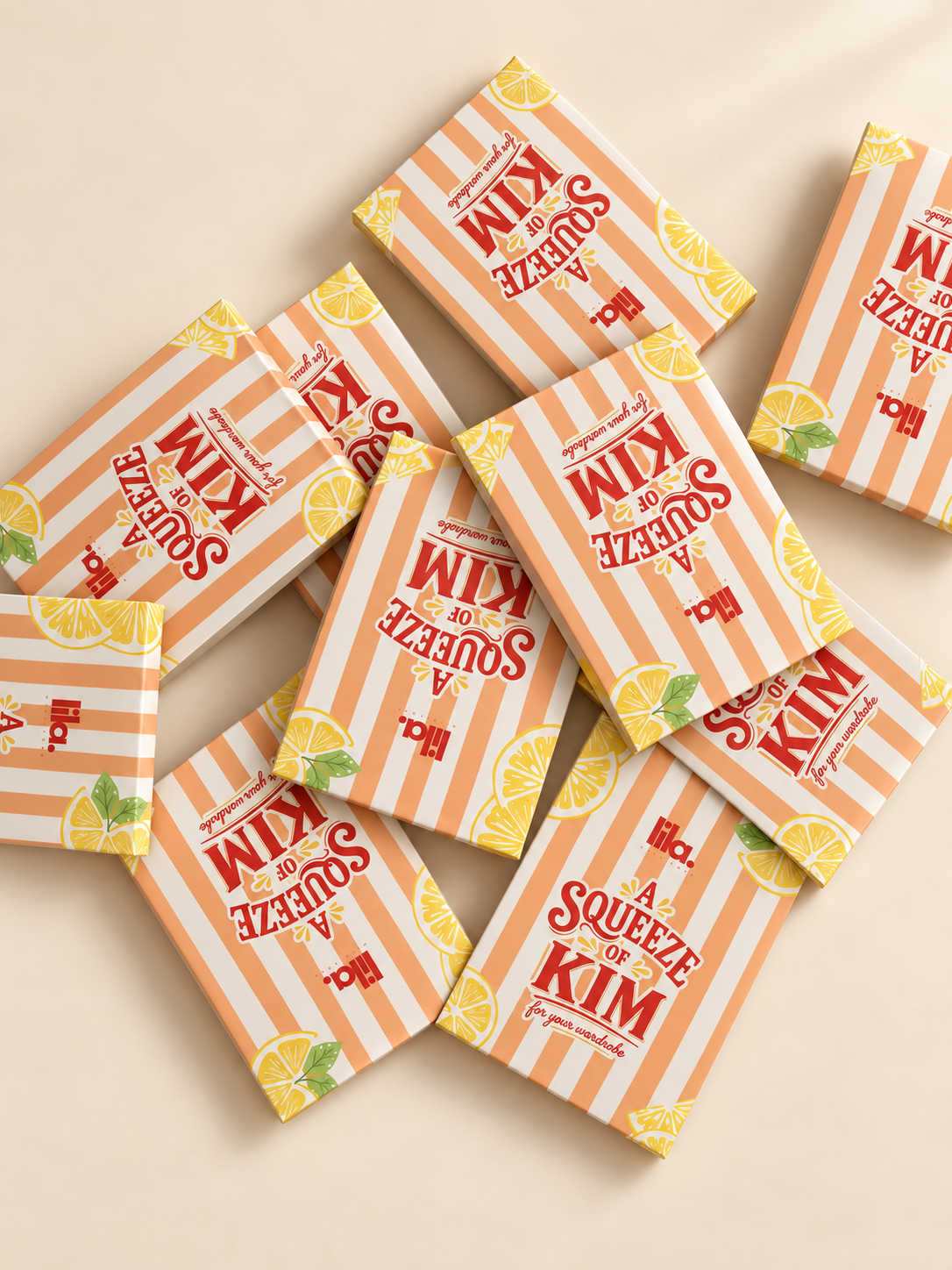 Personalised Lila giveaway boxes in orange stripes and lemons, printed A Squeeze of Kim, for your wardrobe